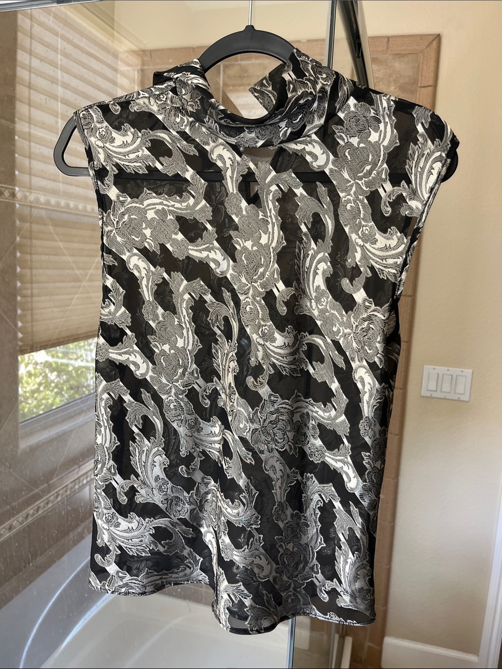 Sleeveless Mock-Neck Camisole in Black and Silver Paisley